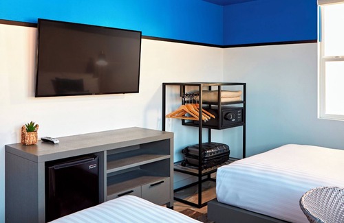 North Pacific Beach Hotel | Coastal Retreat: Modern Room Brimming with Ocean Ambiance