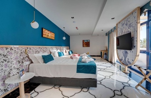 Oura Hotel | Coastal Stay with Waterslide, Buffet, Walk to Dining and Nightlife