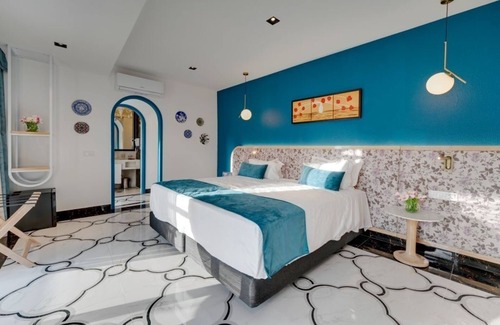 Oura Hotel | Coastal Stay with Waterslide, Buffet, Walk to Dining and Nightlife