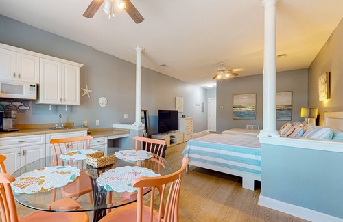 Sea Trail Apartment | Coastal Suite with golf course view and shared pool access