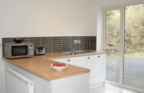 Borth-y-Gest House | Coastal with private lawn and a sea view garden
