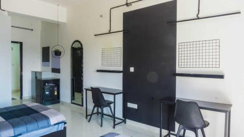 Krishnarajapura Hotel | Collection O Local Square | Whitefield