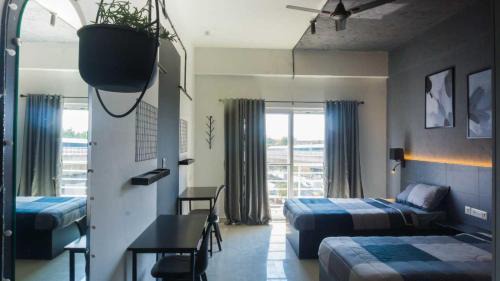 Krishnarajapura Hotel | Collection O Local Square | Whitefield