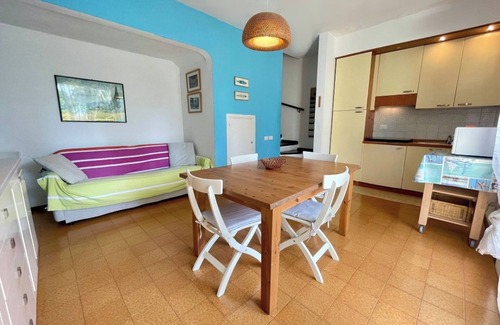 Porto Santa Margherita Villa | Colorful house with pool and garden