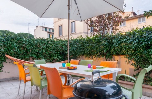 Le Cure Apartment | Colorful Boccaccio apt with Patio and Motorcycle Place