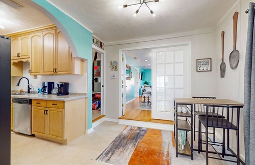 East Daytona House | Colorful charmer with ocean views, deck, & dog-friendly yard - snowbird-friendly