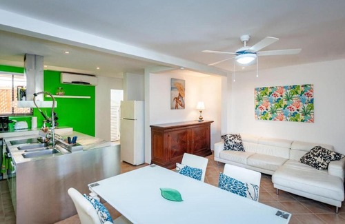 Coco Sunset Hills Apartment | Colorful, Classy, Modern Split-Level Near Beach with Pool