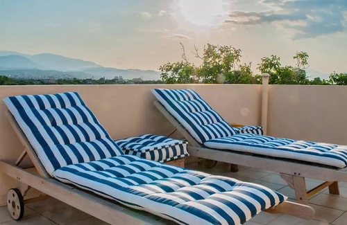 Aigialeia Apartment | Colorful maisonette A2 with sun terrace and pool close to the beach