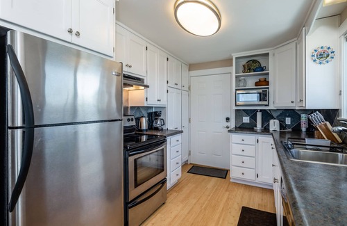 Camano Island House | Come for the Birdseye view of water, whales, mountains and more - stay to relax.