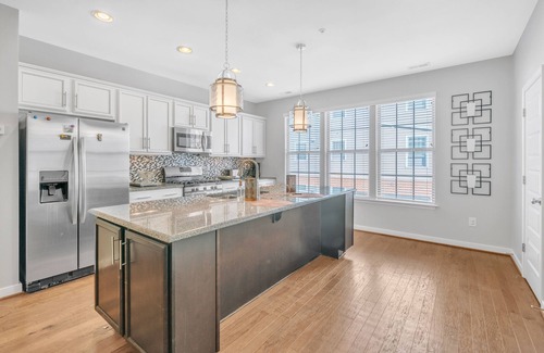 Richmond Condo | Come Home to Waterfront Living at Rockette's Landing by RedAwning