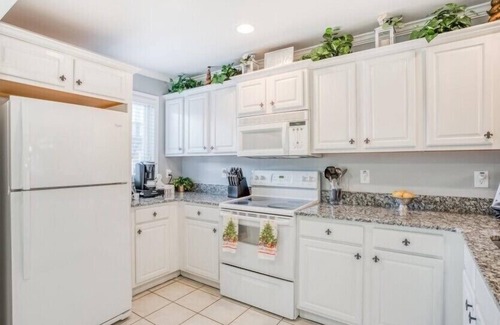 Helen House | Come visit Santa at “Regal On The River” with Hot Tub in Downtown Helen 🎄