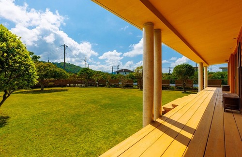 Kunigami House | Comes with a loft Our proud natural grass spreads throughout the approximately 500 garden Okuma R/Kunigami-gun Okinawa