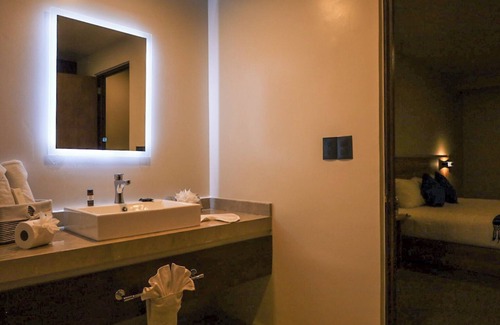 Tlaxcala Hotel | Comfortable room with king size bed in the heart of downtown Tlaxcala.