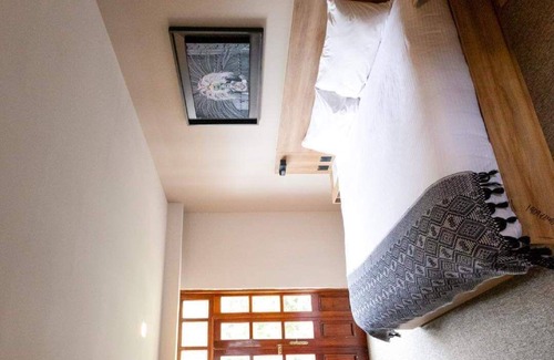 Tlaxcala Hotel | Comfortable room with king size bed in the heart of downtown Tlaxcala.