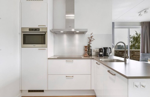 Leuken Apartment | Comfort 2-person water house in the holiday park Landal Marina Resort Well