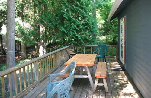 Baileys Harbor Cottage | Comfort and beauty tucked between the trees.