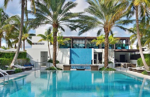 Palm Beach House | Comfort & Convenience! Private Beach Access | Free Parking + Onsite Pool