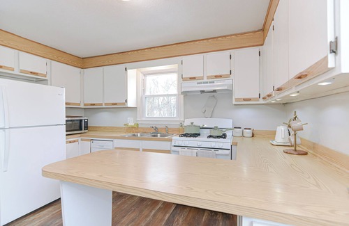 Lowell Apartment | Comfort Oasis with Private Garage. Steps from UMass Lowell & 35 min from Boston