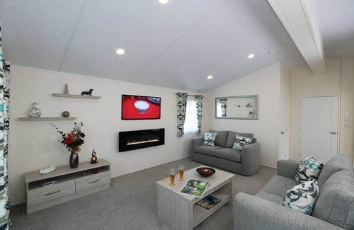 Hexham House | Comfortable 12ft-wide caravan with one double and two twin.