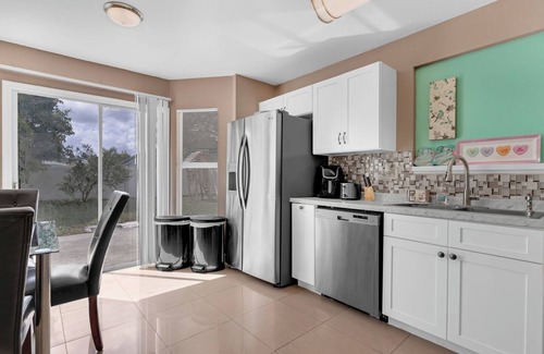 Orlando House | Comfortable 4BR Getaway: WiFi and Parking Included