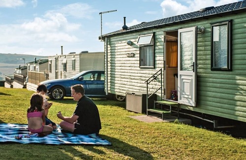 Perranporth House | Comfortable and spacious 12ft-wide caravan with one double and one twin.