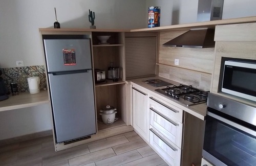 La Possession House | Comfortable apartment with terrace and direct pool access