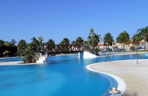 Almerimar Apartment | Comfortable apartment in residence with swimming pool, children's playground