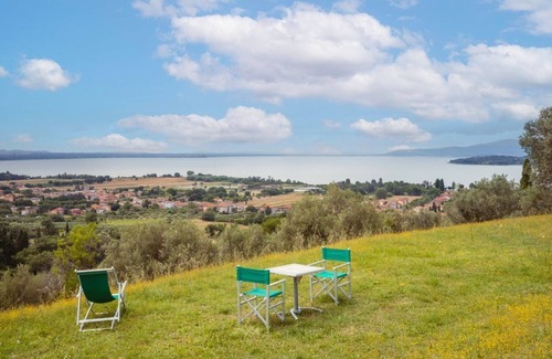 Magione Apartment | Comfortable apartment located in a historic Abbey from the year 1000, restored in 1980.La Badia is a small Benedictine Abbey immersed in a park of centuries-old olive trees.Located on the ground floor, there is a mezzanine for the sleeping area.There are
