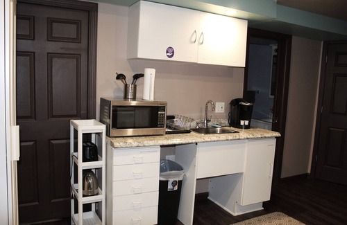 Wildwood Condo | Comfortable private unit with hot tub and free parking