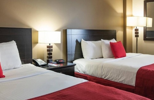 Grande Prairie Hotel | Comfortable Retreat Near Airport – Perfect For Business Trips!