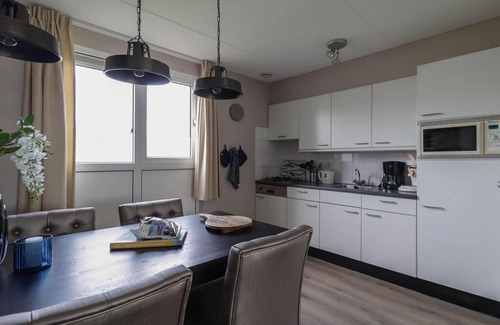 Makkum House | Comfortable semi-detached bungalow for 4 persons with spacious yard and bathtub, located on the waterfront at Beach Resort Makkum.