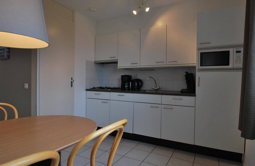 Makkum House | Comfortable semi-detached bungalow for 4 persons with spacious yard and bathtub, located on the waterfront at Beach Resort Makkum.