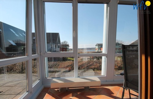 Neuensien Apartment | Comfortable vacation apartment with lake view and conservatory in the Seedorf vacation park