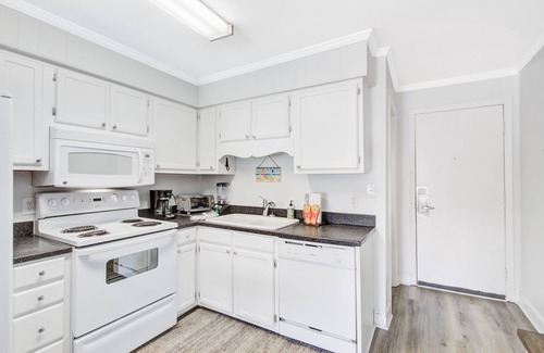 Isle of Palms Villa | Comfortable villa one row away from the beach w/shared pool & grills
