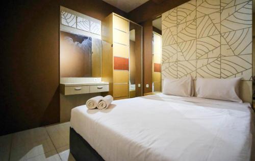 Surabaya Apartment | Comfy and Homey 2BR at Bale Hinggil Apartment By Travelio