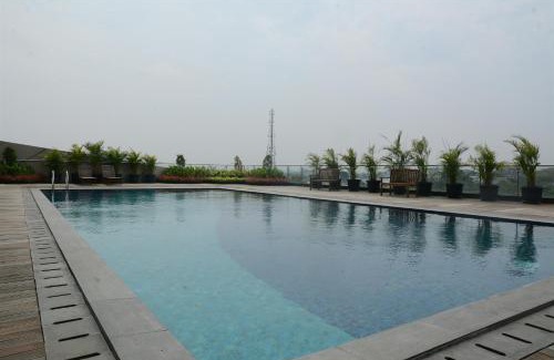 Serpong Apartment | Comfy and Minimalist Studio Apartment at Tree Park City BSD By Travelio