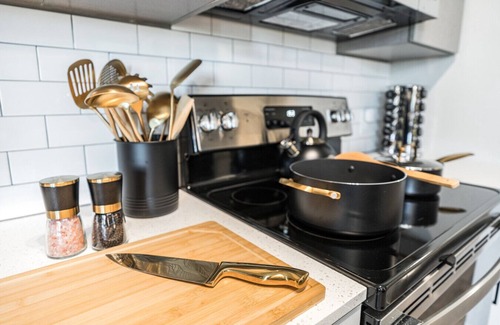 Boise Apartment | Comfy King Bed, Hot Tub, Coffee Bar, Gym