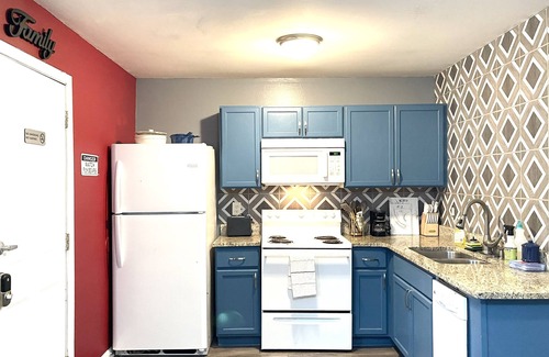 West End House | Comfy Luxe Villa Downtown with Custom Mural