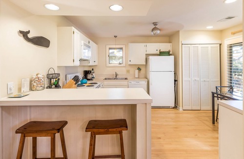 West Beach Cottage | Community pool/dock, EV friendly
