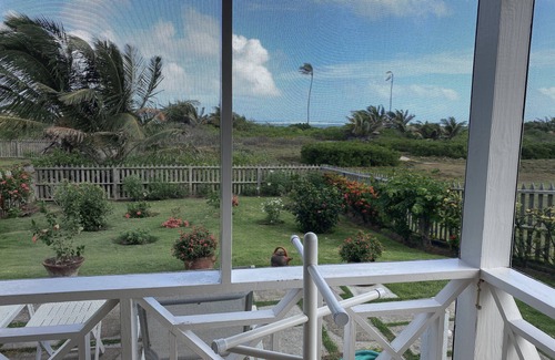 Newcastle Cottage | CONCH SHELL COTTAGE at white sand beach.