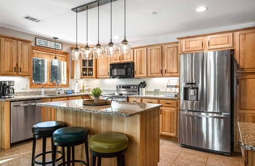 Arkdale Condo | Condo at waterfront resort with golf course views, central AC, W/D, & pool