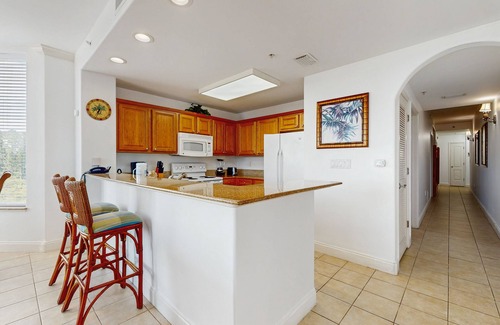 Florida Central Atlantic Coast Condo | Condo near Disney attractions, water view, gym, W/D, AC and wifi