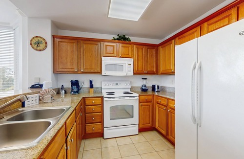 Florida Central Atlantic Coast Condo | Condo near Disney attractions, water view, gym, W/D, AC and wifi