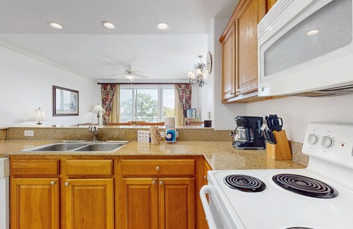 Florida Central Atlantic Coast Condo | Condo near Disney attractions, water view, gym, W/D, AC and wifi