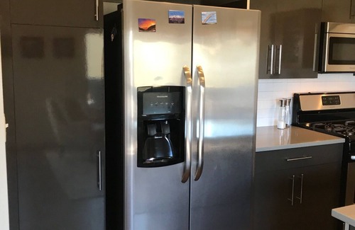 Steel Yards Apartment | Condo with deck facing the mountain, bike path and restaurant across the street, 5 min driving from down town