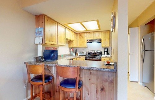 Swiss Manor House | Condo with full kitchen, balconies, views of Mt. Elden - close to town