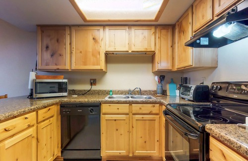Swiss Manor House | Condo with full kitchen, balconies, views of Mt. Elden - close to town