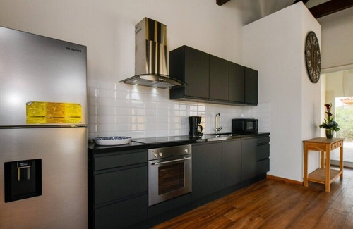 Santa Cruz House | Connect with nature through a mix of luxurious and striking details.