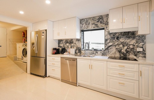 Ashgrove Apartment | Contemporary 2-Bedroom Apartment with Movie Room