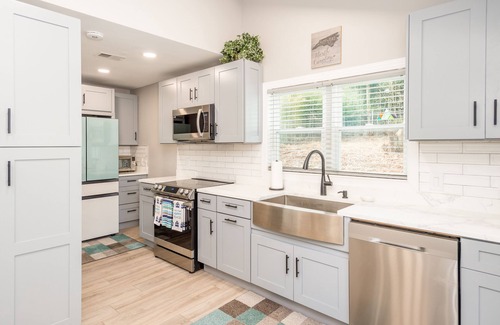 Swannanoa House | Contemporary dog-friendly mountain home with firepit, grill, enclosed backyard